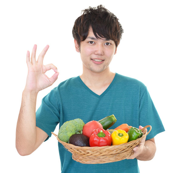 Man with fresh vegetables