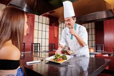 Young lady dining at a Asian restaurant