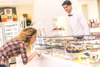 Young lady shopping for a treat