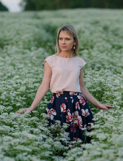 Woman in field of herbs