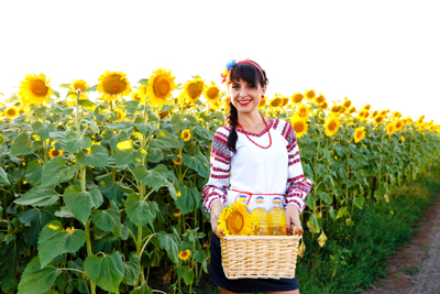 Young woman in sunflower field
