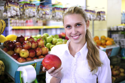 Woman with fresh mango