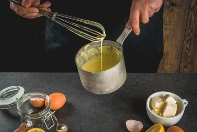 Chef making tasty dip